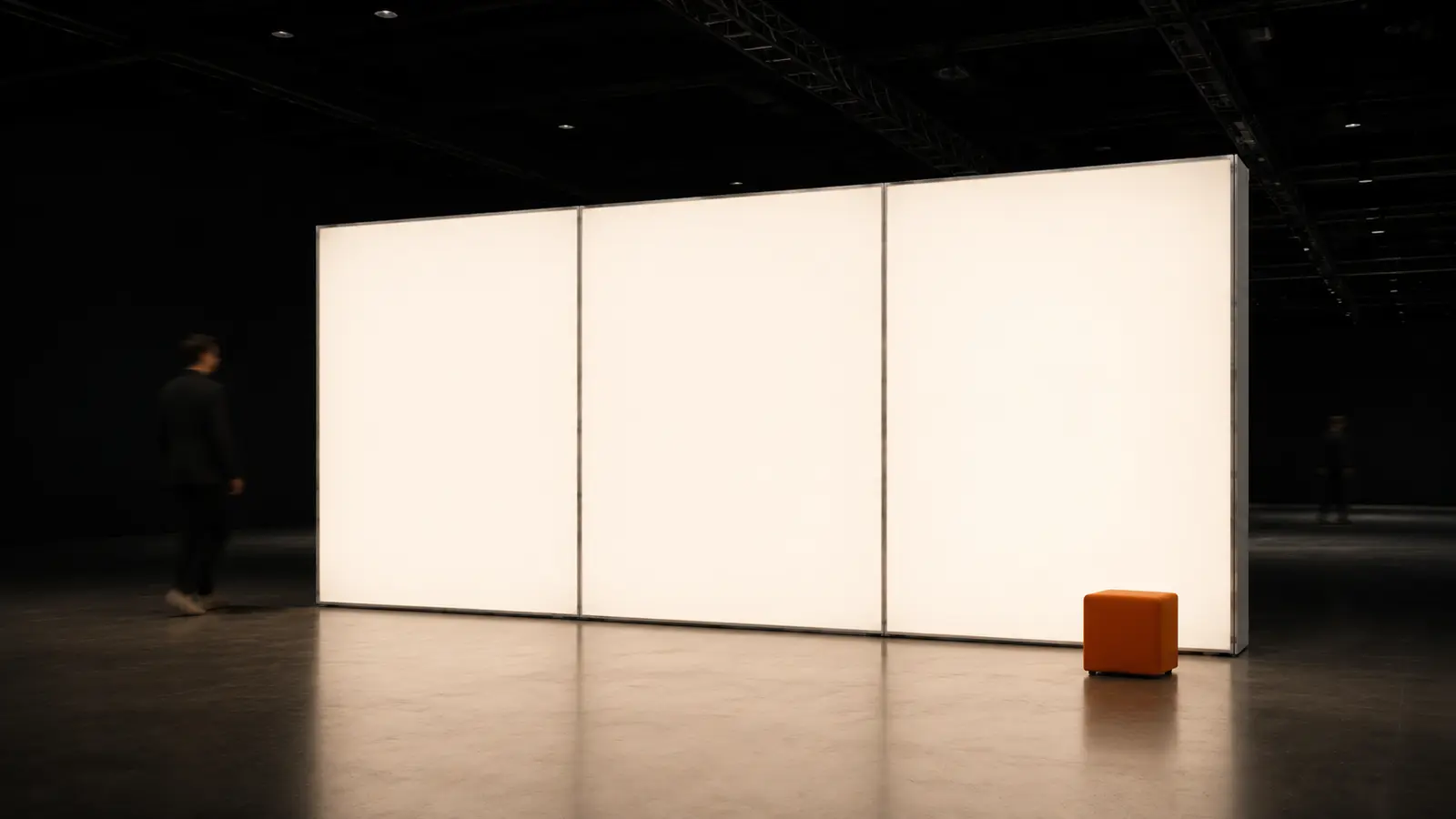 Three connected illuminated panels forming a six-metre wall